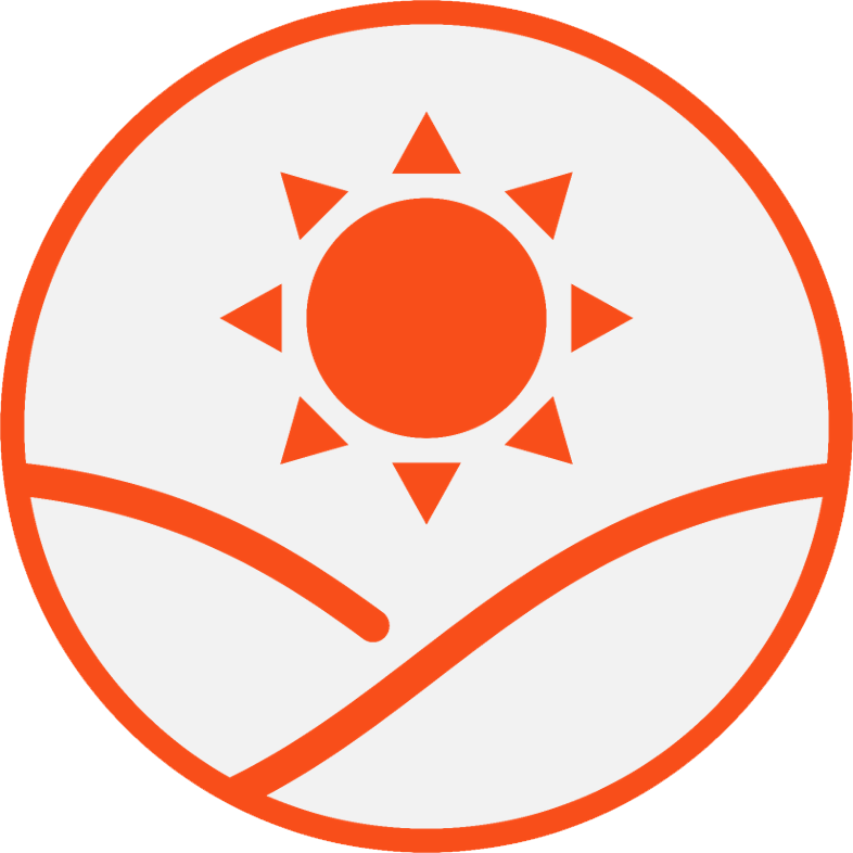 Changes in climate icon - Sun rising between two mountains